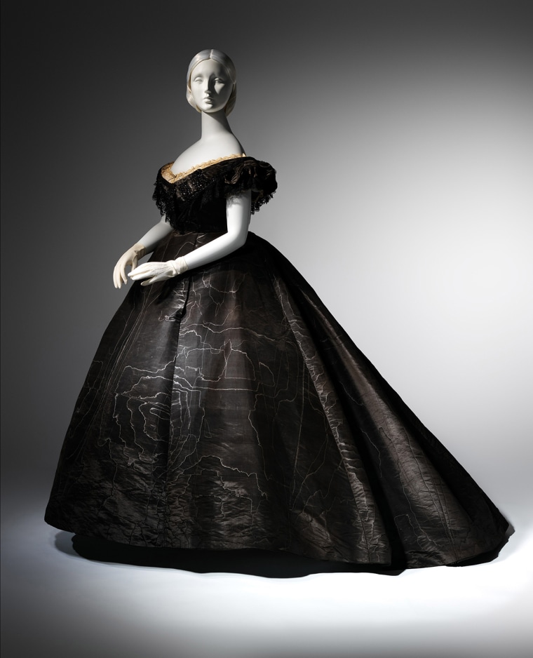 Evening Dress, ca. 1861
Black moirÃ© silk, black jet, black lace
Lent by Roy Langford
(C.I.L.37.1a)
Photo: Â© The Metropolitan Museum of Art, by Karin...