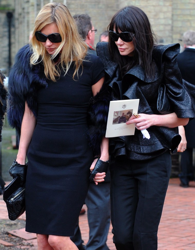 epa02054141 British model Kate Moss (L) leaves British designer Alexander McQueen's funeral held at St. Paul's Church, in London, Britain, 25 February...