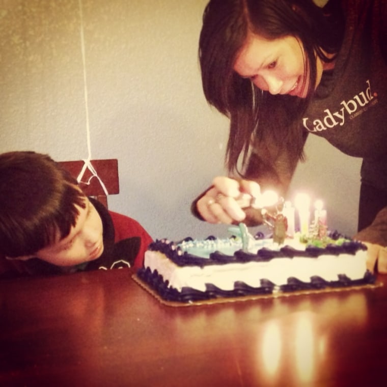 Diane Fornbacher lights candles on a birthday cake for her son, Charlie, 5. And no, it does not contain marijuana.