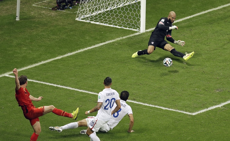 IMAGE: US goalkeeper Tim Howard stops a shot