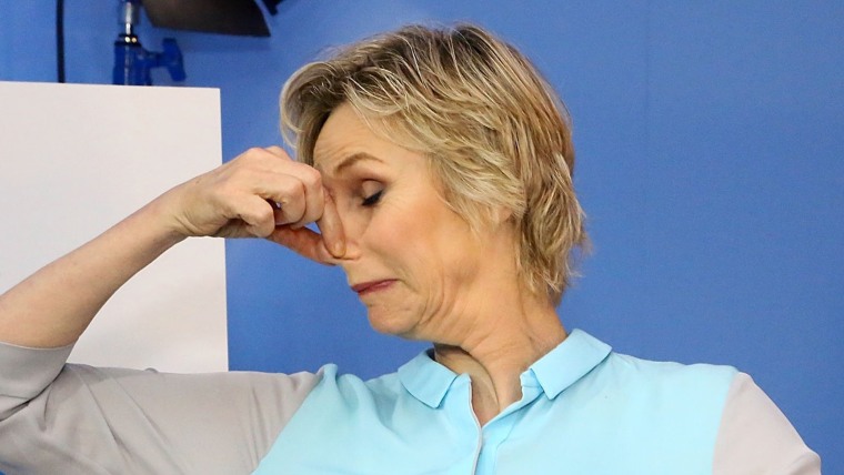 Image: Jane Lynch holding her nose