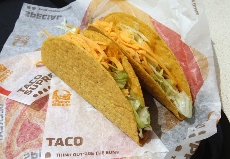 Two crunchy tacos are pictured at a Taco Bell restaurant in Glendale, California April 19, 2011. Taco Bell is part of  Yum! Brands, the world's larges...