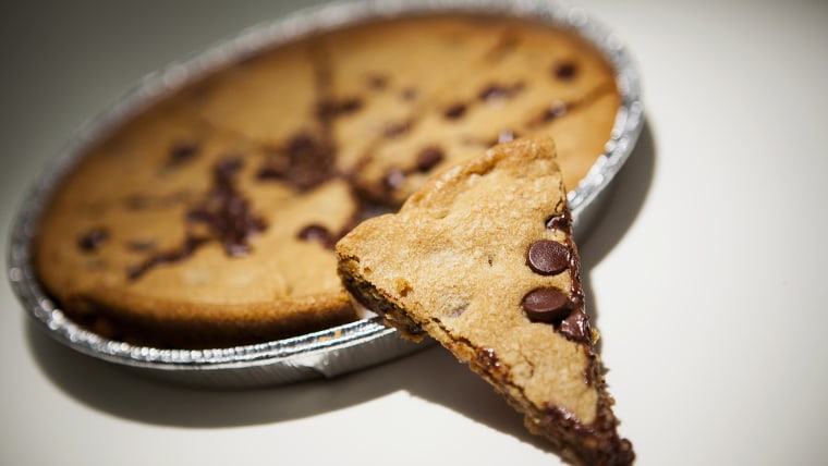 Pizza Hut introduced the \"pizza cookie\" whihch contains an average of 165 Hershey's smi-sweet chocolate chips.