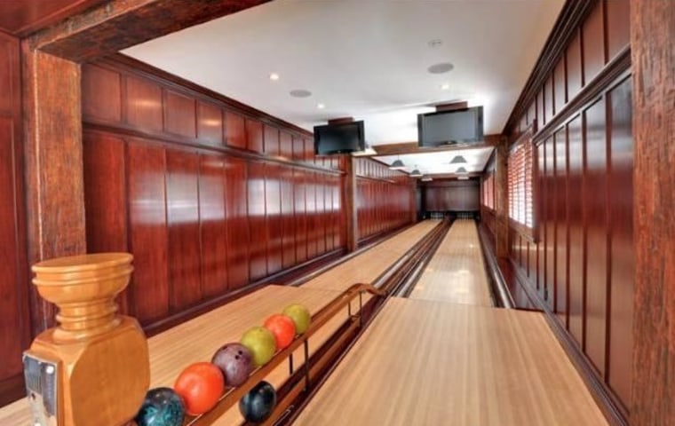 A lot of features fit in nearly 10,000 square feet of living space, like this bowling alley.