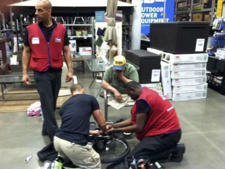 Lowe's employees help fix vet's wheelchair.