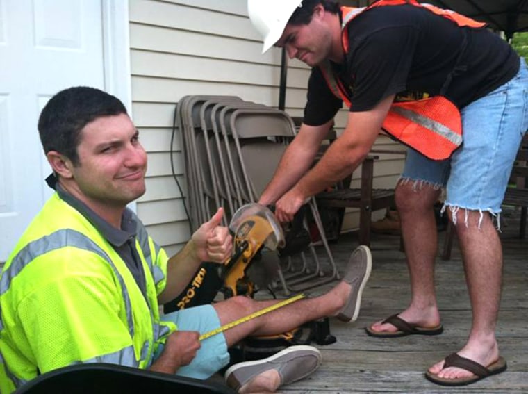 JJoe and his best friend Aaron Wagoner pretend to buzz-saw Joe's foot off.