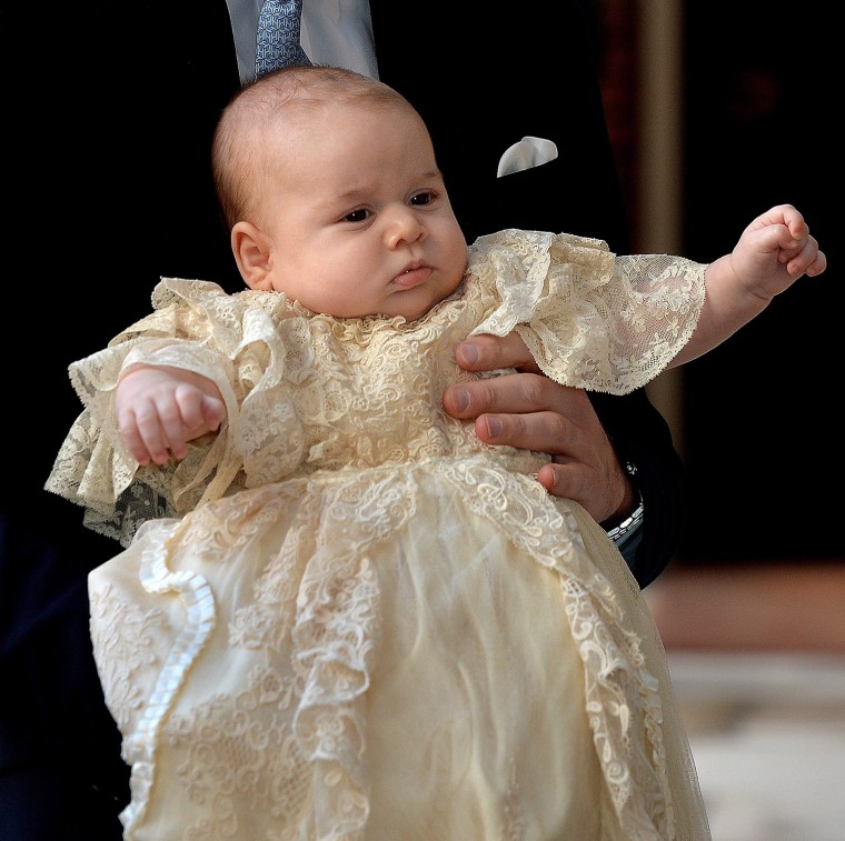 epa04315298 (FILE) A file picture dated 23 October 2013 shows Britain's Prince William, Duke of Cambridge holding his son Prince George of Cambridge a...