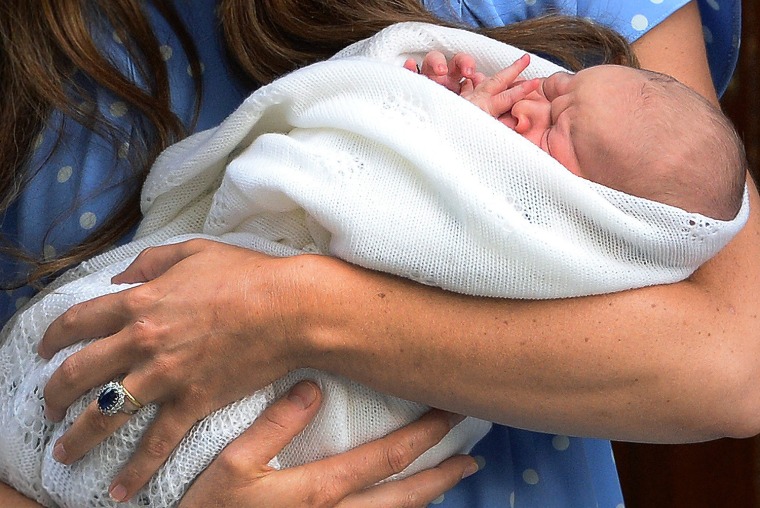 epa04315299 (FILE) A file picture dated 23 July 2013 shows Catherine, Duchess of Cambridge, (L) holding her newborn baby boy St. Mary's hospital in Lo...