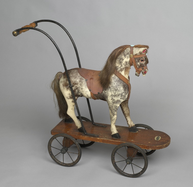 A toy horse on wheels that Princess Elizabeth and Princess Margaret played with in the 1930s