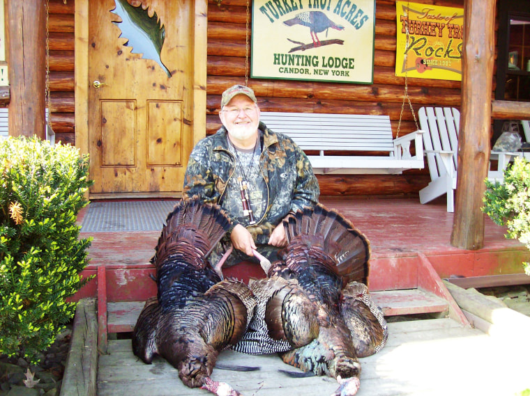 Marlin Watkins with wild turkeys bagged at Turkey Trot Acres.