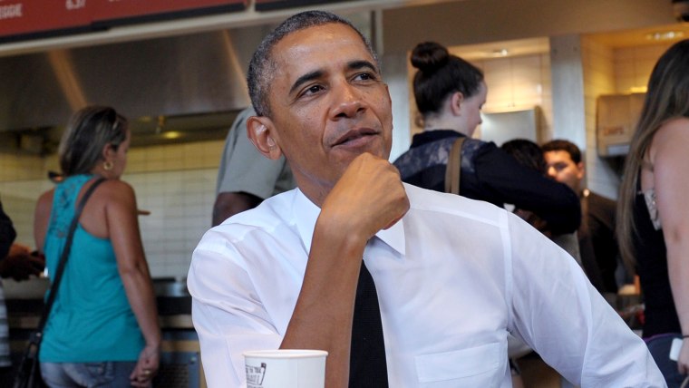 US President Barack Obama stops for lunch at a Chipotle Mexican Grill restaurant before attending the White House Summit on Working Families on June 2...
