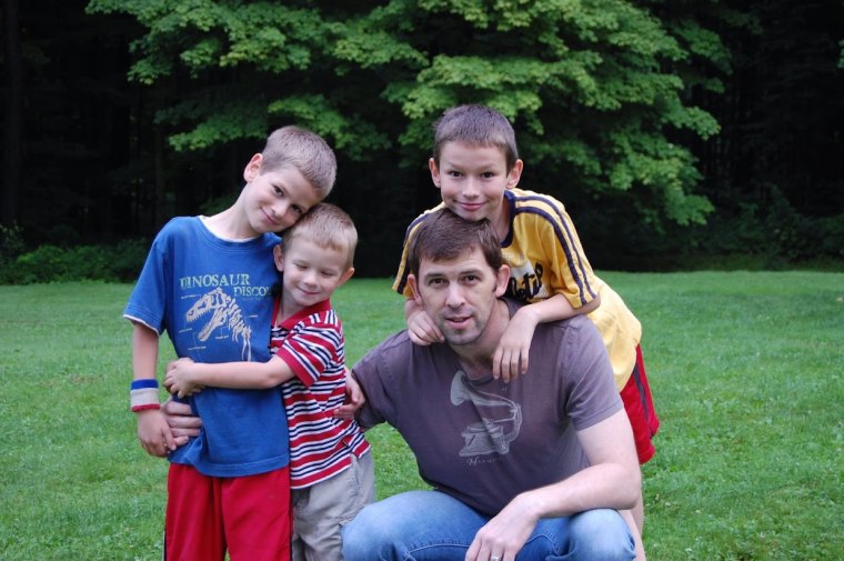 Ron Mattocks and his three sons.