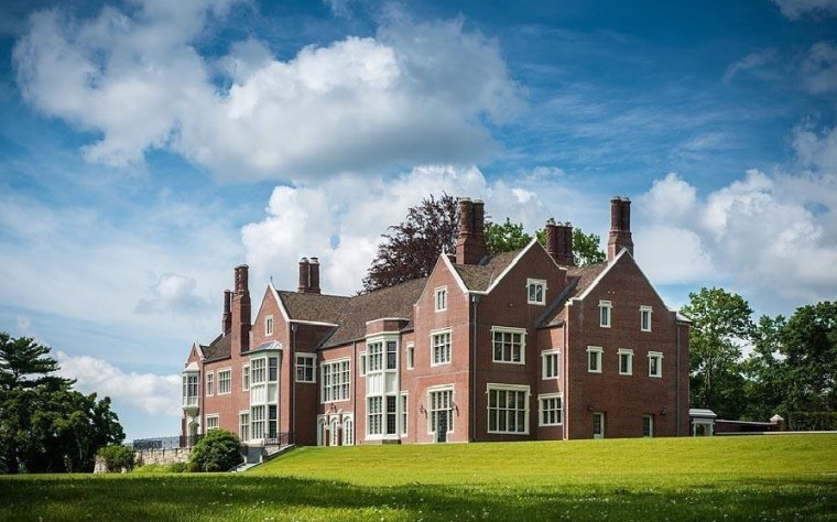 The 17,493-square-foot brick estate sits on 40 acres.