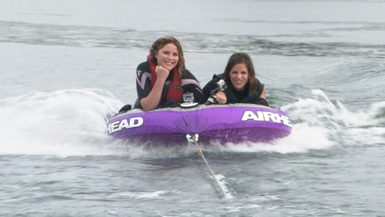 Jenna and Natalie go tubing on the lake.