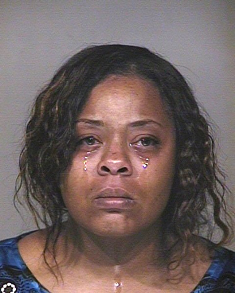Shanesha Taylor, 35, is pictured in this undated handout booking photo from the Scottsdale Police Department obtained by Reuters April 7, 2014. Taylor...
