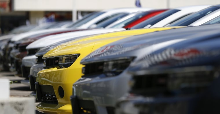 A group of Chevrolet Camaro cars for sale is pictured at a car dealership in Los Angeles, California in this April 1, 2014 file photo. Automakers repo...