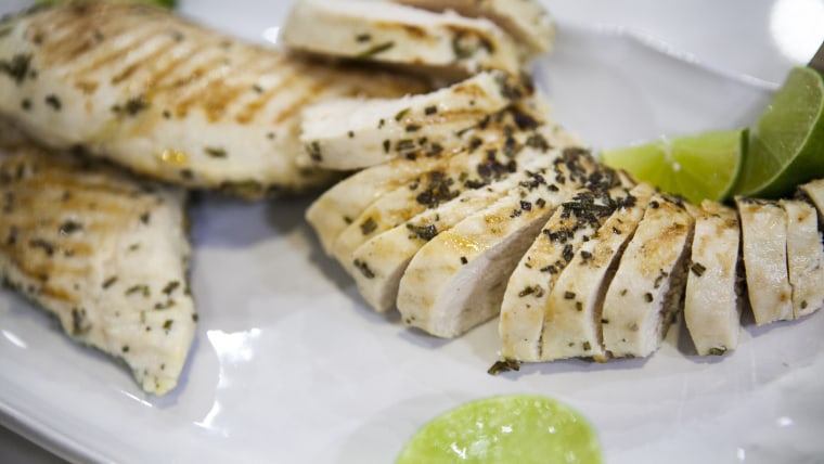 Pati Jinich, Al Roker and Natalie Morales prepare lime-rubbed chicken on the TODAY show in New York, on July 28, 2014.