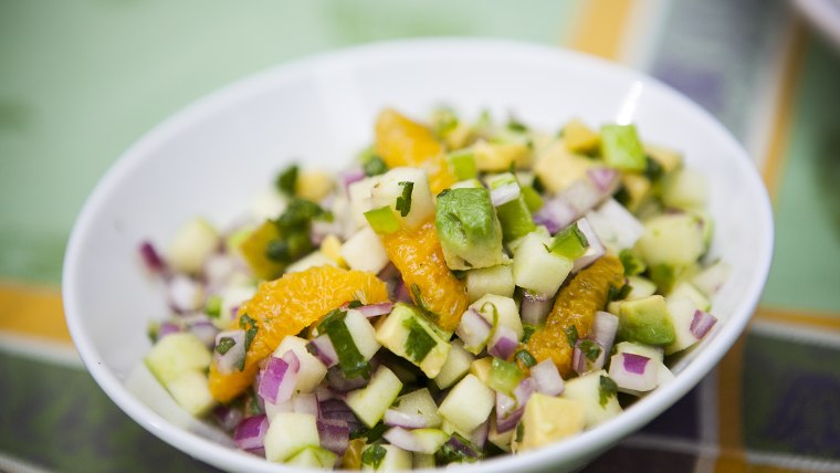 Guy Turland and Carson Daly make jerk chicken and steak sandwiches on the TODAY show as part of the Fresh Cooks Live: Summer Sizzle series in New York...