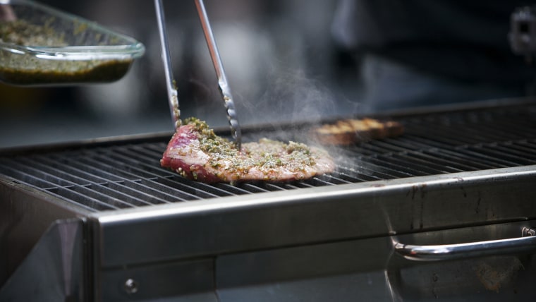 Guy Turland and Carson Daly make jerk chicken and steak sandwiches on the TODAY show as part of the Fresh Cooks Live: Summer Sizzle series in New York...