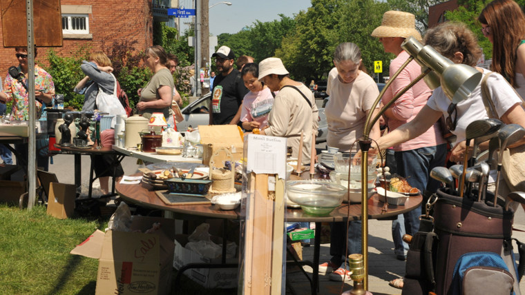 OTTAWA, CANADA - MAY 26: Thousands of people gather at the annual Glebe neighborhood garage sale which takes place for several blocks in the Glebe are...