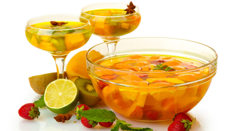 punch in bowl and glasses with fruits, isolated on white; Shutterstock ID 112375988; PO: today.com