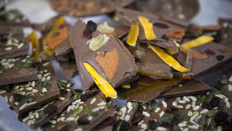 Jacques Torres, Hoda Kotb and Kathy Lee Gifford make chocolate on the TODAY show in New York, on July 29, 2014.