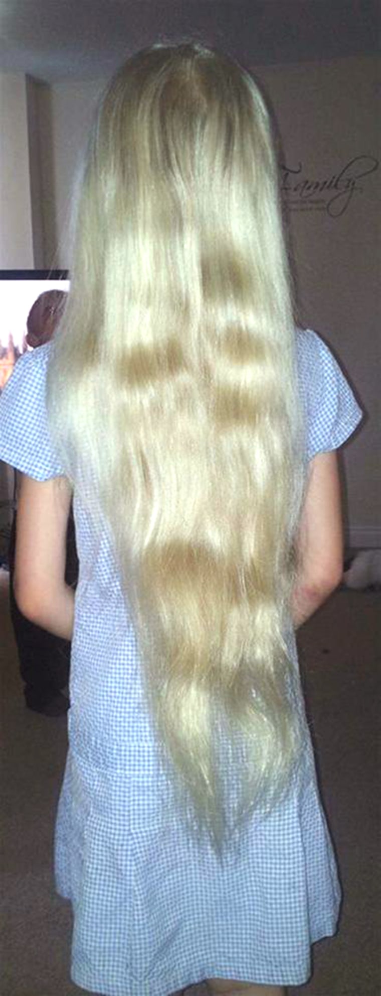 Charlie Tillotson's long hair, pre-cut.