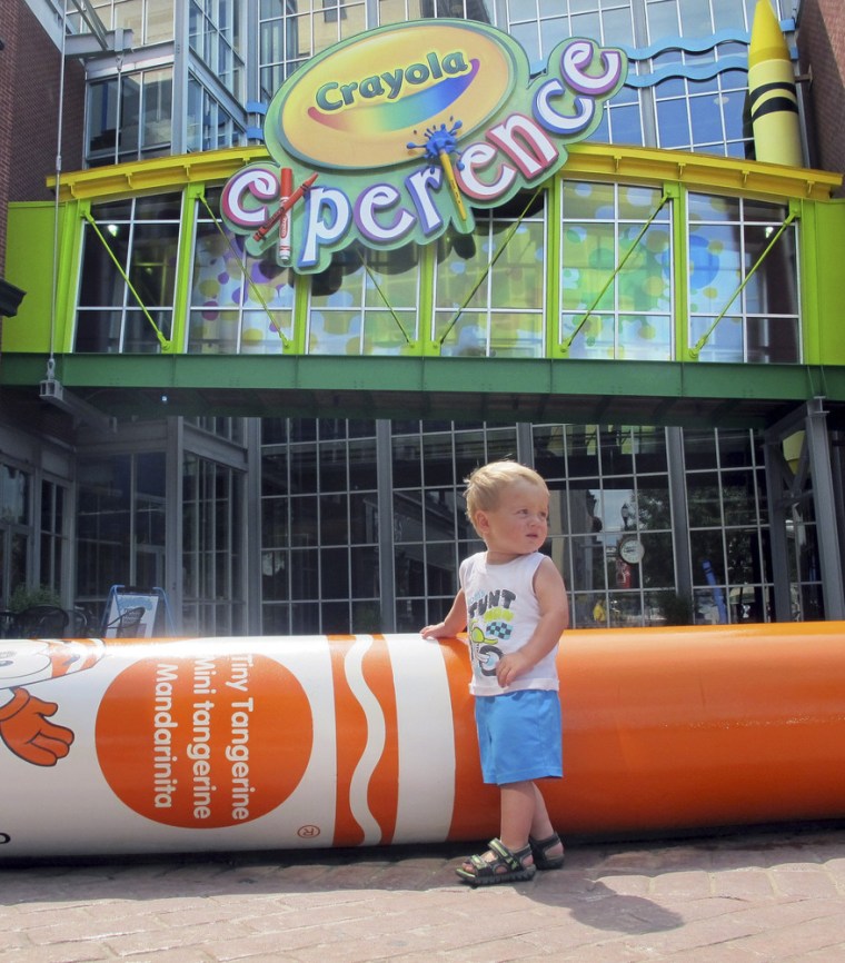 William Schmid, 18 months, of Gardners, Pennsylvania, plays outside the Crayola Experience attraction Tuesday in Easton, Pennsylvania. Crayola announced Tuesday it will build a second attraction at The Florida Mall in Orlando, Fla., to open in summer 2015.