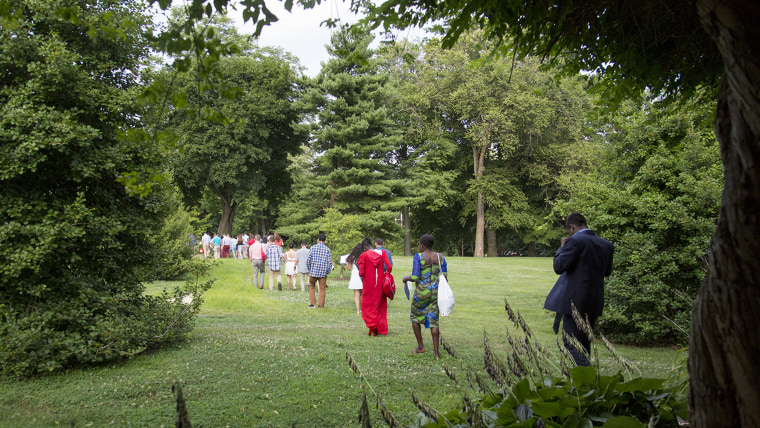 Participants file out as Project Common Bond 2014 comes to an end.