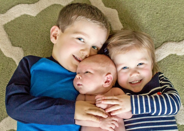 Andrew Flynn with his older brother Thomas, 3 and Olivia, 5.