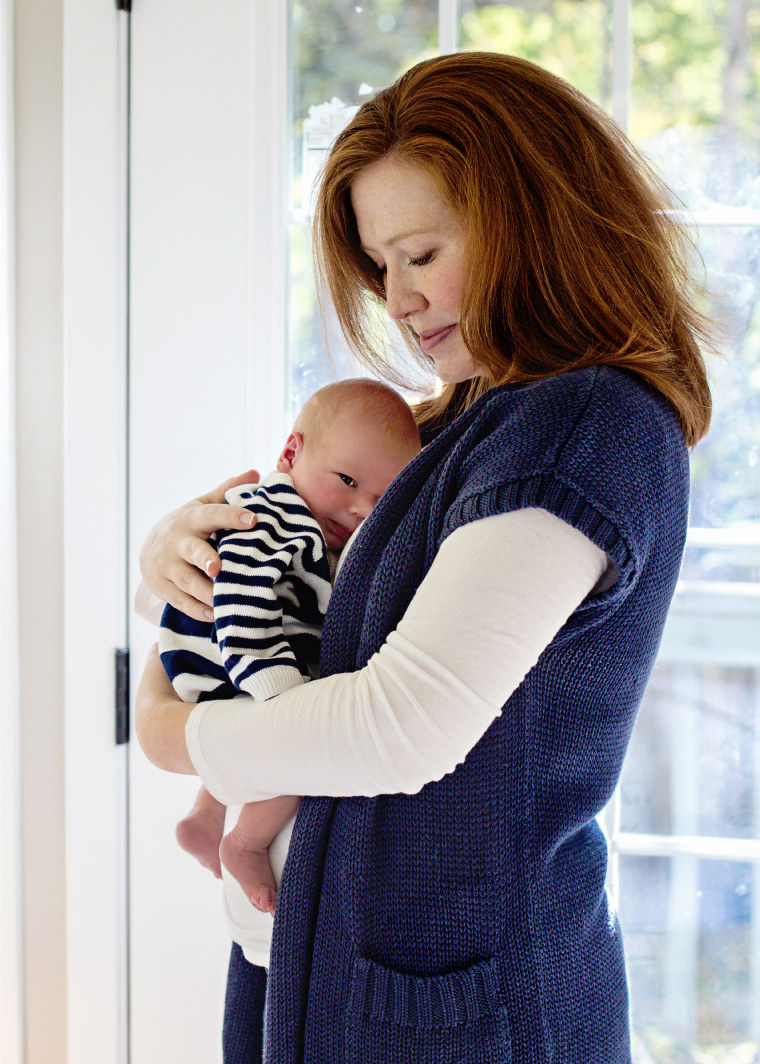 Megan Flynn and her infant son Andrew. Flynn joined an ovarian cancer registry and discovered she had a cancer-causing genetic mutation she could pass onto her own kids.