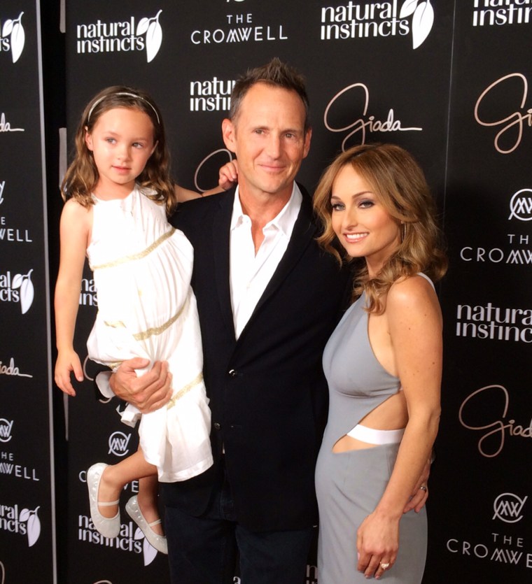 Giada de Laurentiis is joined by her husband, Todd Thompson, and daughter, Jade, during a preopening VIP event for her new restaurant, \"Giada,\" on Monday night.