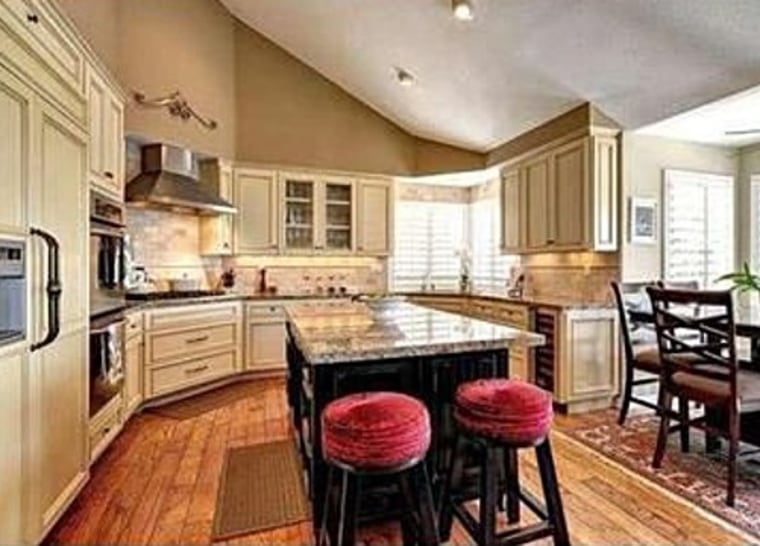 Charlie Sheen's Westlake Village home features a custom granite kitchen.