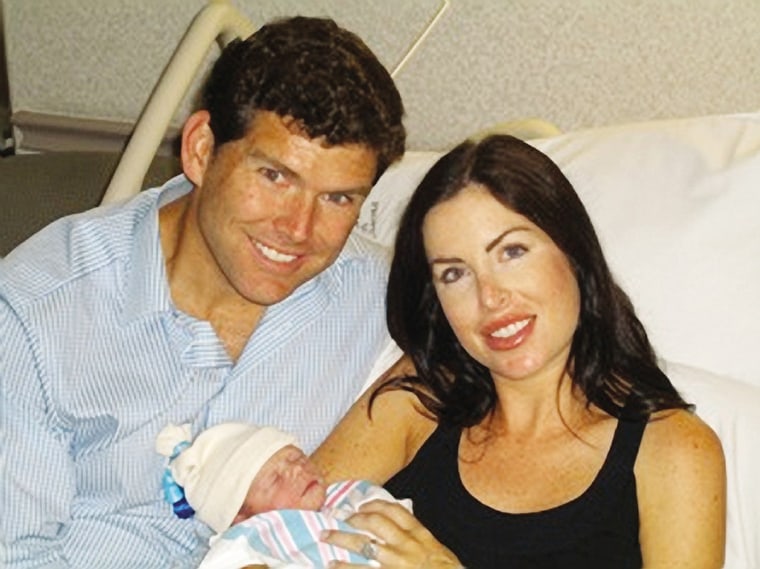 Bret and Amy Baier with their newborn son, Paul