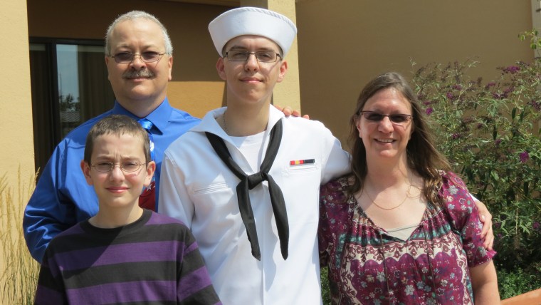 Jeff and Terry Jones stand with sons Dylan and Nicholas following Dylan’s graduation from boot camp in August of 2012. Jeff never planned on being a s...