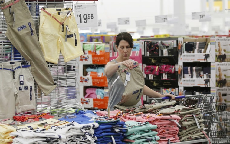 A customer looks over the selection of clothes at a Sam's Club during a media tour in Bentonville, Ark., June 5, 2014. Sam's Club will soon offer chip-enabled \"smart\" credit cards.