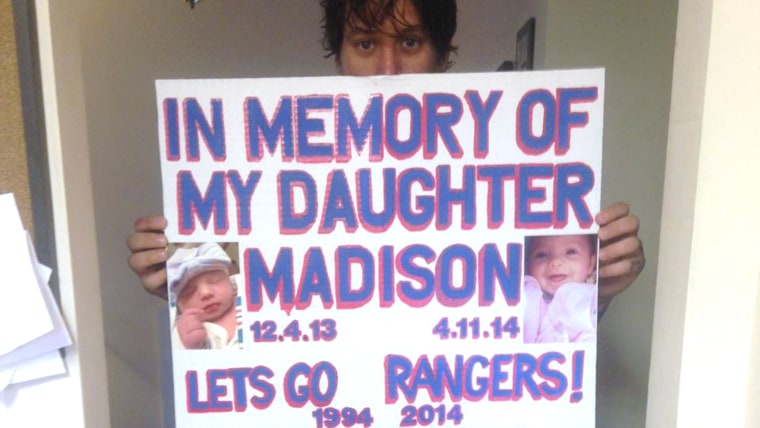The sign that led Rangers fans to raise enough money to send a grieving dad to Stanley Cup finals.