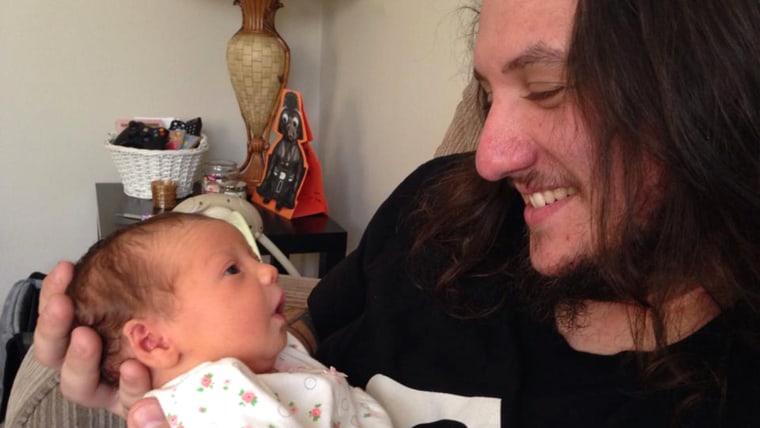 Bobby Ackerman with his daughter, Madison, who died when she was four months old.