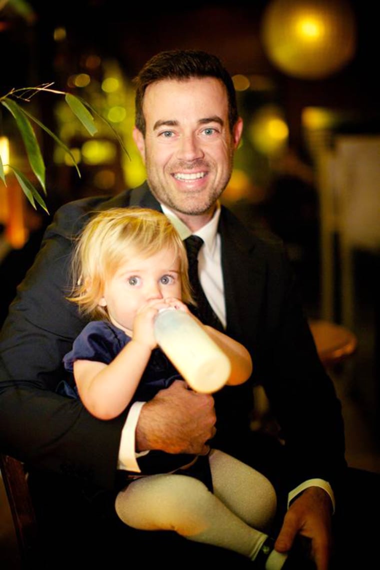 Image: Carson Daly holds his daughter, Etta.
