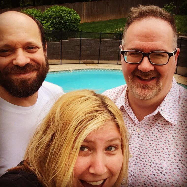 Oren Miller, left, with wife Beth and fellow dad blogger Brent Almond, on Memorial Day weekend. Miller was having back pain related to his cancer that weekend, but didn't yet know what was causing it.
