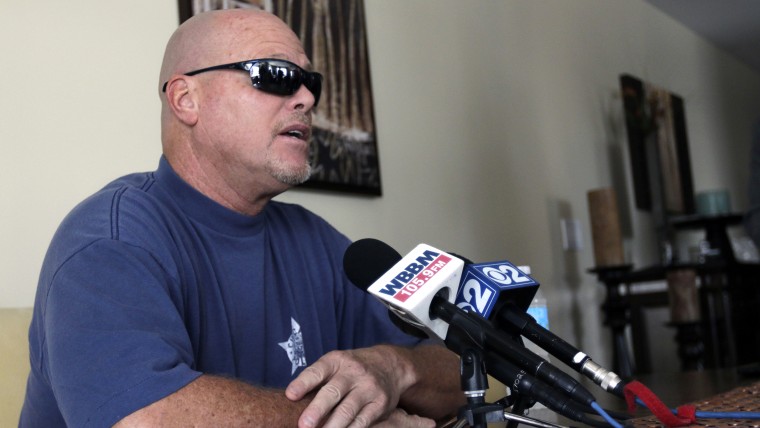 Former NFL football quarterback Jim McMahon speaks during a news conference Tuesday, June 17, 2014 in Chicago.  McMahon spoke of his ongoing battle wi...