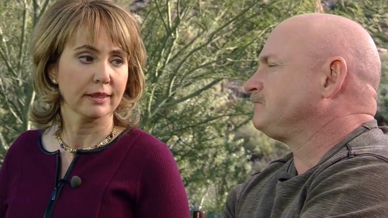 Gabrielle Giffords is pictured with her husband, former astronaut Mark Kelly, in January 2014.