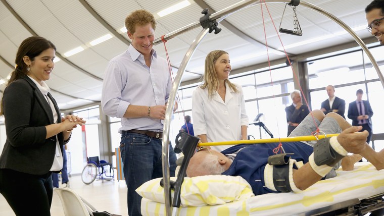 Prince Harry visits hospital patients, takes canoe trip on 4-day
