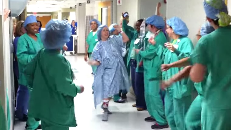Woman dances into breast cancer surgery.