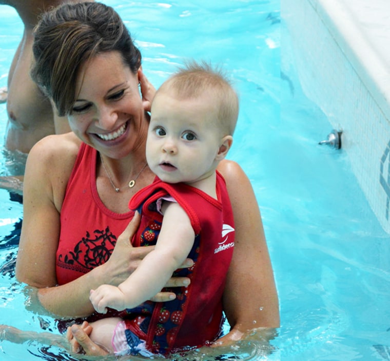 Jenna and baby Harper, at a traditional swim lesson.
