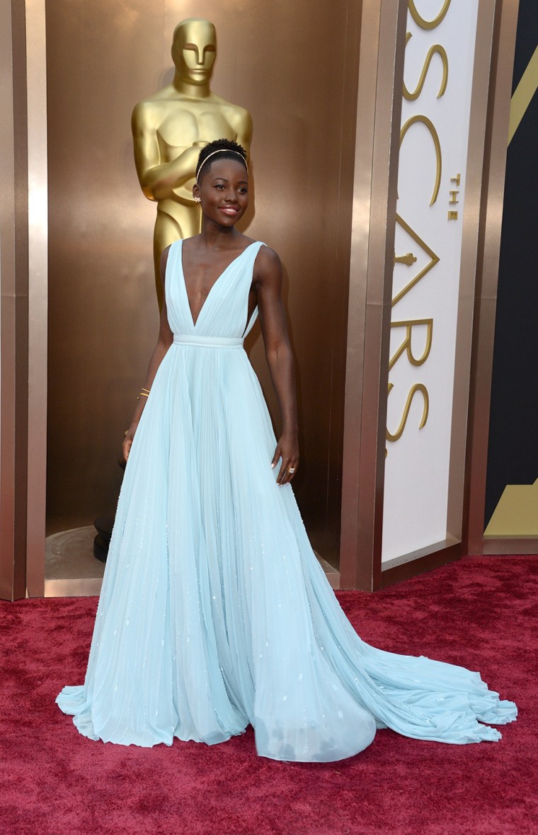 Nominee for Best Supporting Actress in \"12 Years a Slave\"  Lupita Nyong'o arrives on the red carpet for the 86th Academy Awards on March 2nd, 2014 in ...