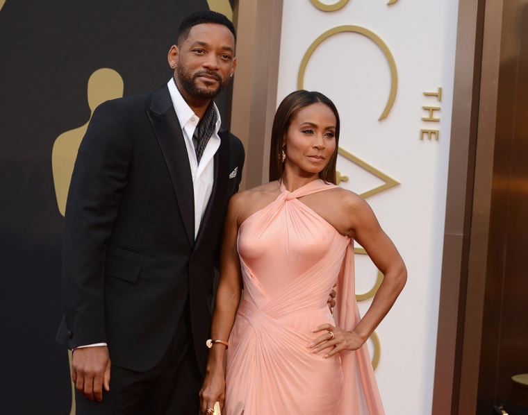 Will Smith, left, and Jada Pinkett Smith arrive at the Oscars on Sunday, March 2, 2014, at the Dolby Theatre in Los Angeles.  (Photo by Jordan Strauss...