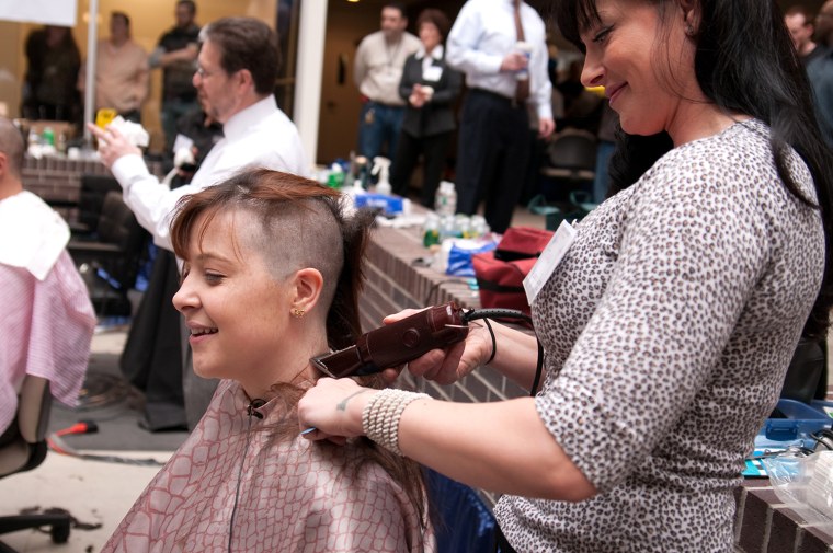 Image: Haircuts for charity at Granite Telecommunications