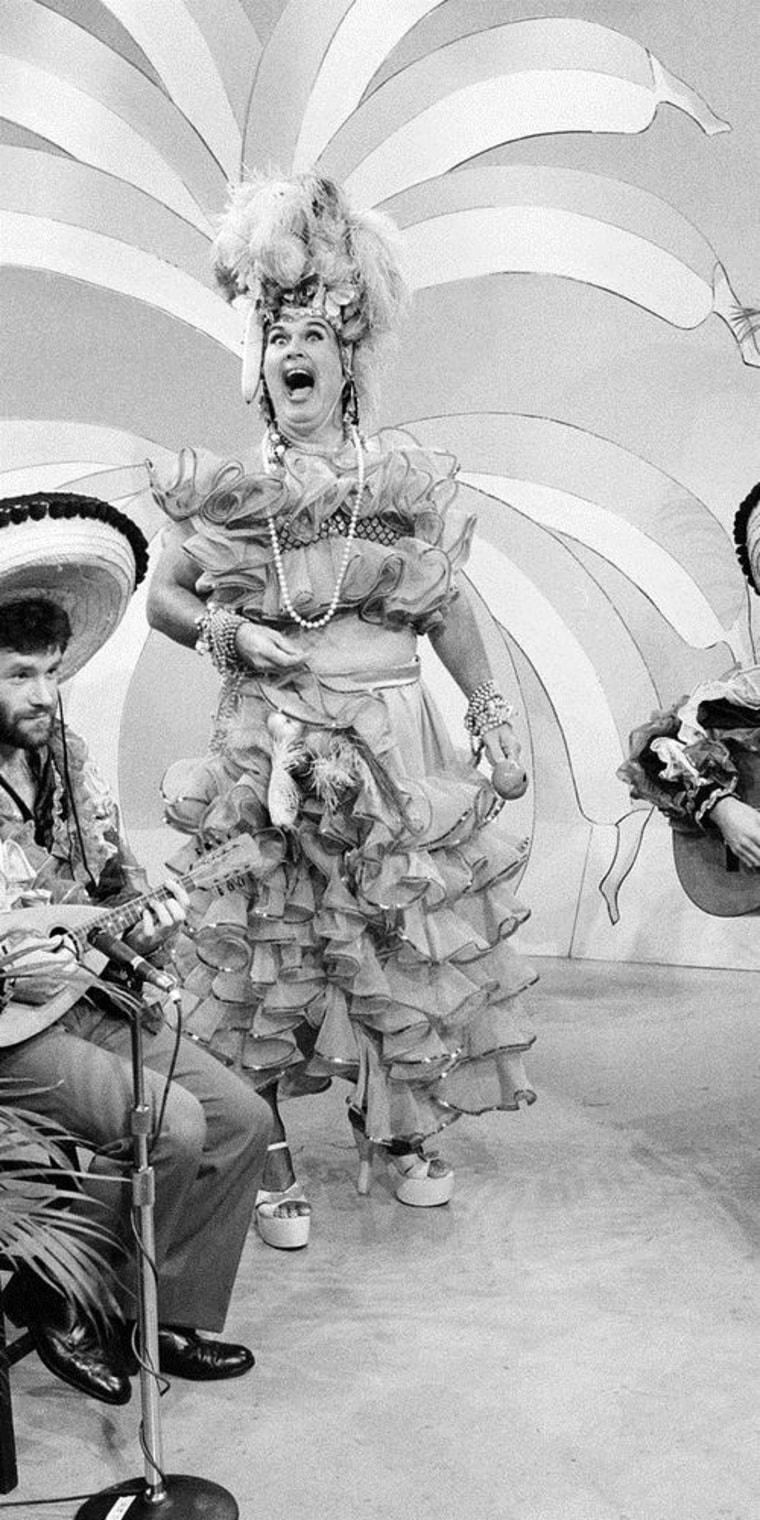 Willard Scott dresses up as Carmen Miranda for a broadcast.