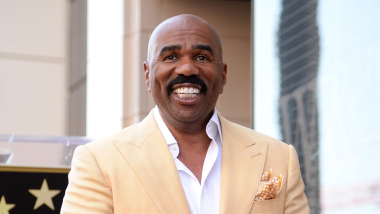 Steve Harvey smiles at his star unveiling ceremony in Hollywood, California, on May 13, 2013.  Harvey received the 2,497th star o...